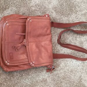 Convertible crossbody/backpack.